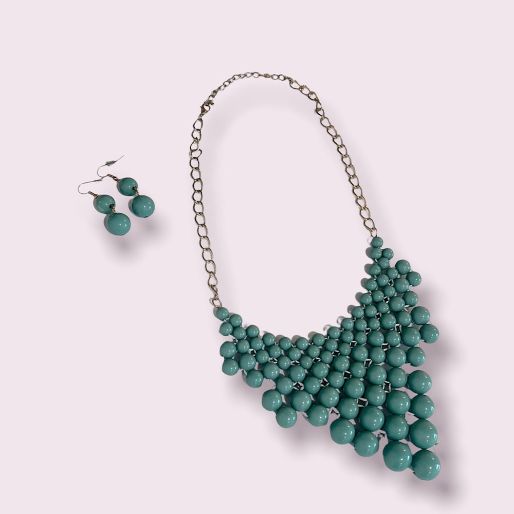 Teal beaded statement necklace with matching earrings